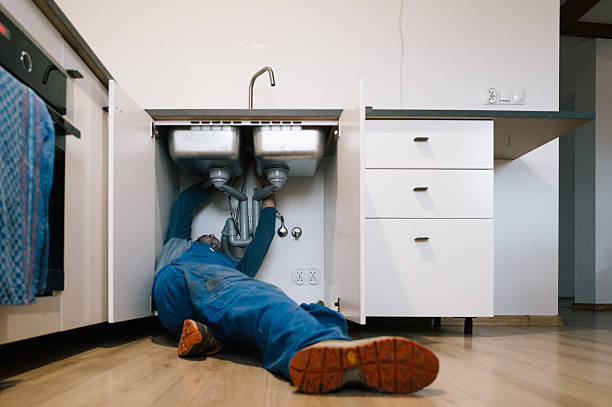 Professional Drain Cleaning technician working in Mason, TN